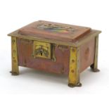 Arts & Crafts enamel, copper and brass casket with embossed floral motifs raised on four stylised