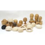 Collection of vintage wooden mannequin hat moulds