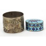 Silver objects comprising Art Nouveau German silver napkin ring and a silver and enamel pill box