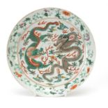 Chinese porcelain shallow dish finely hand painted in the famille verte palette with two dragons