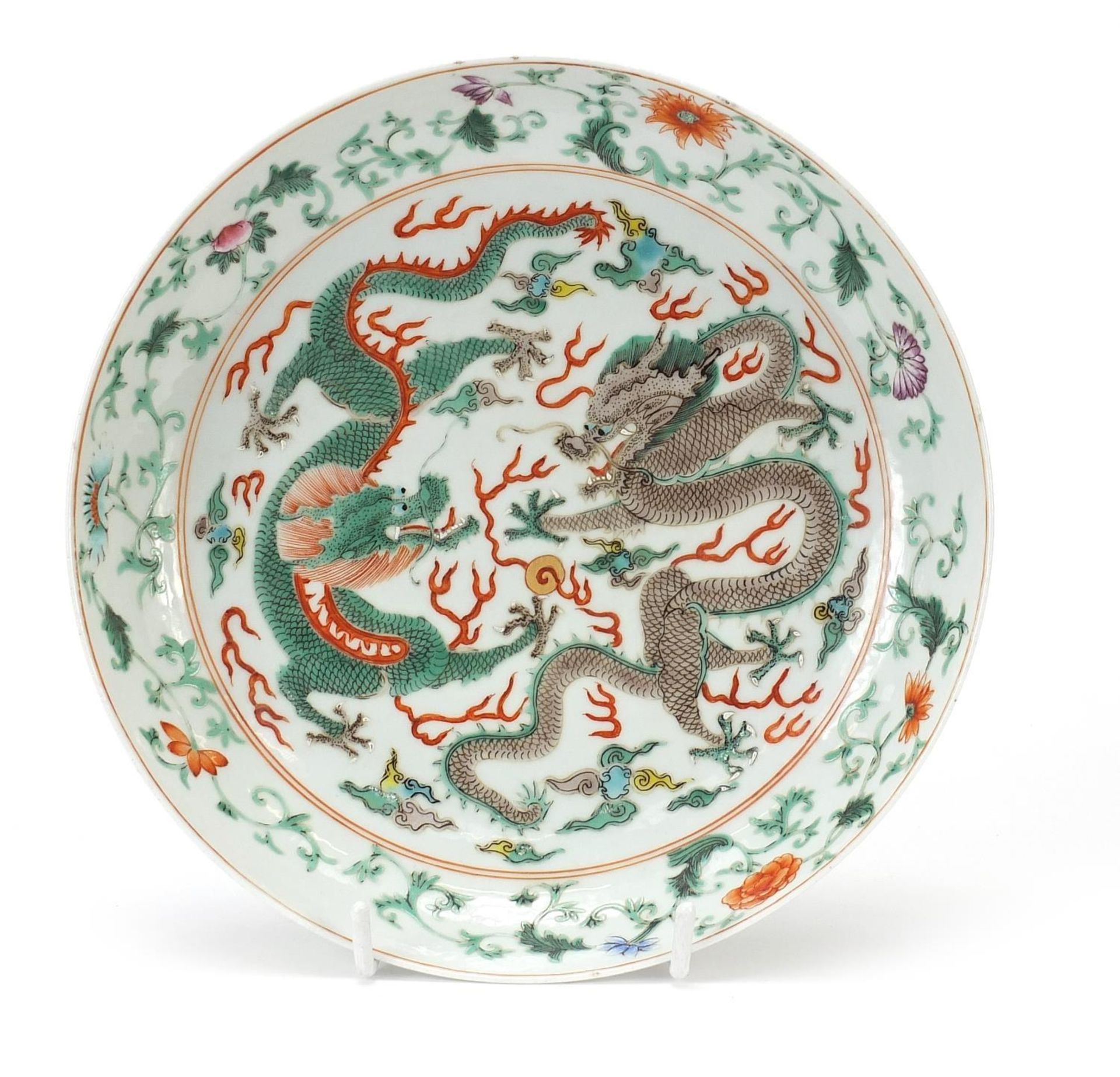 Chinese porcelain shallow dish finely hand painted in the famille verte palette with two dragons