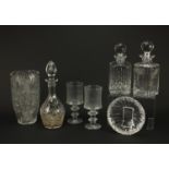 Cut glassware including three decanters, Waterford dish and a good quality vase, the largest 33cm