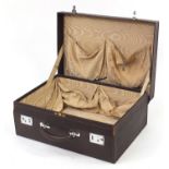 Mappin & Webb, Early 20th century leather motoring trunk with cover and silk lined interior, 17.