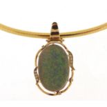 14ct gold opal and diamond pendant on an 18ct gold Omega pattern necklace, the opal approximately