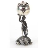 Russian silver caster with hinged lid and Putti support, impressed marks, 10cm high, 63.8g