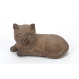 Chinese carved boxwood okimono of a cat, character marks to the underside, 9cm wide