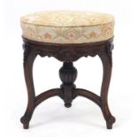 Victorian walnut adjustable piano stool with shell carving and scroll feet, 46cm high x 39 cm in