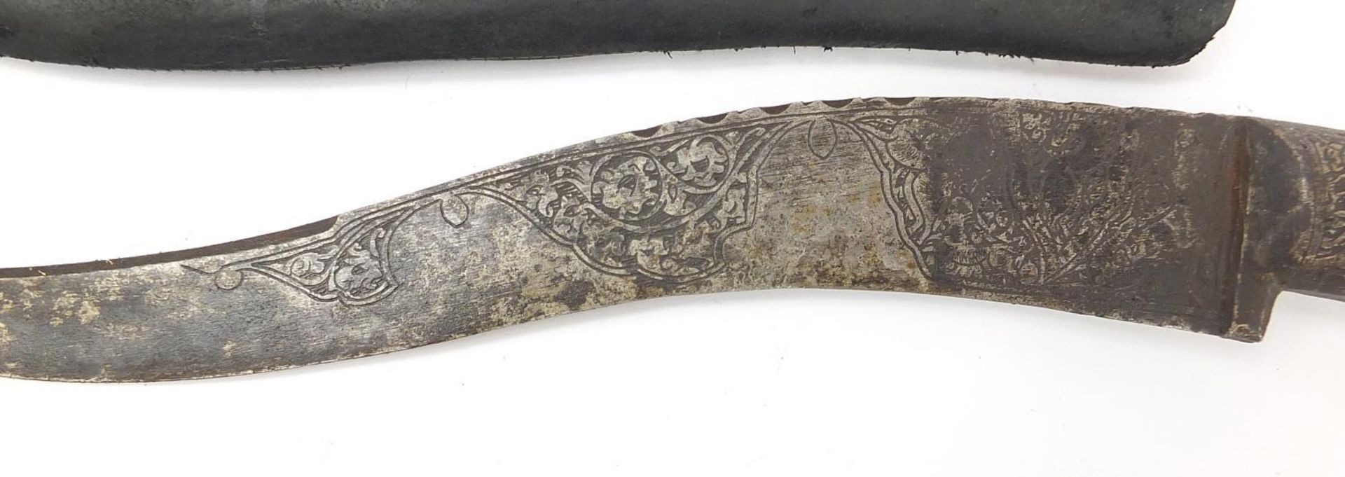 Afghan Pesh-kabz knife with bone handle, sheath and steel blade engraved with a wild animals and - Image 4 of 8
