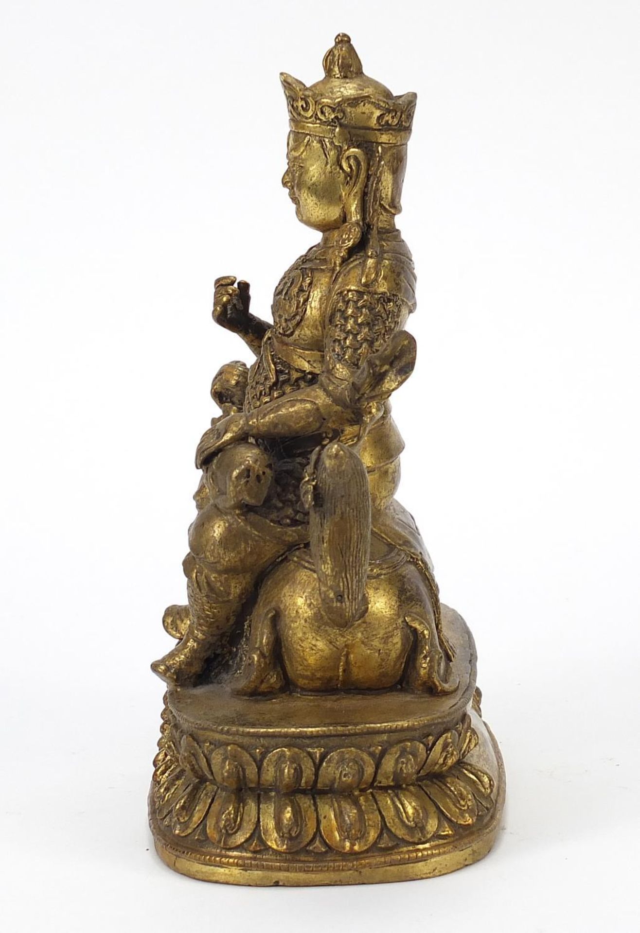 Chino Tibetan patinated gilt bronze figure of an Emperor on mythical animal, 23.5cm high - Image 3 of 8