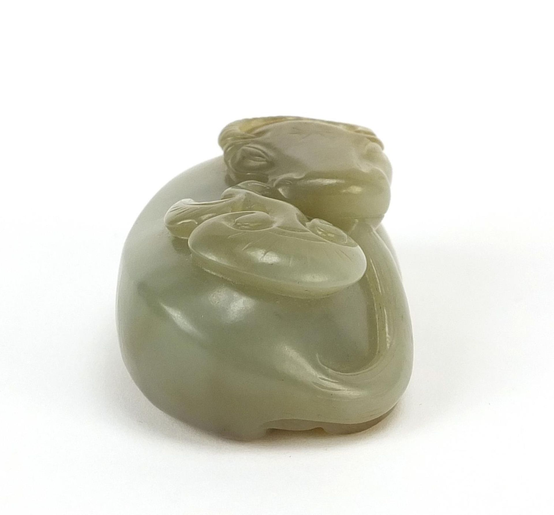 Chinese celadon and russet jade carving of a buffalo, 7cm wide - Image 5 of 7