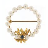 9ct gold pearl and sapphire brooch, 3cm in diameter, 5.2g