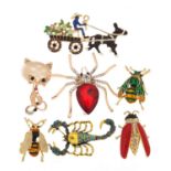 Seven jewelled and enamel animal and insect brooches including scorpion, horse and cart, cat and