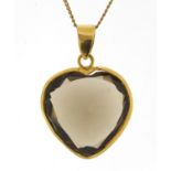 Smoky quartz love heart pendant with gold coloured metal mount, on a 9ct gold necklace (1.6g), 3cm