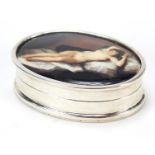 Oval sterling silver pill box, the hinged lid enamelled with a nude female, 3.7cm wide, 19.2g