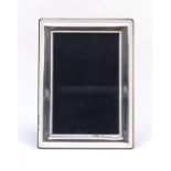 Carrs, rectangular silver easel photo frame, London 2000, 19cm x 13.5cm