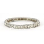 Unmarked white metal diamond eternity ring, size M, 1.3g