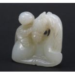 Chinese white jade carving of boy and horse, 5.5cm in length