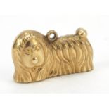 9ct gold shaggy dog charm, 2.1cm in length, 1.4g
