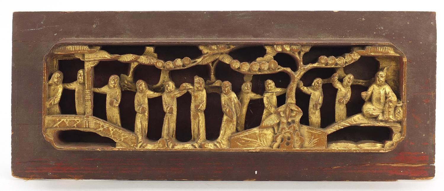 Chinese partially gilt wood panel carved with figures, 40cm x 16cm