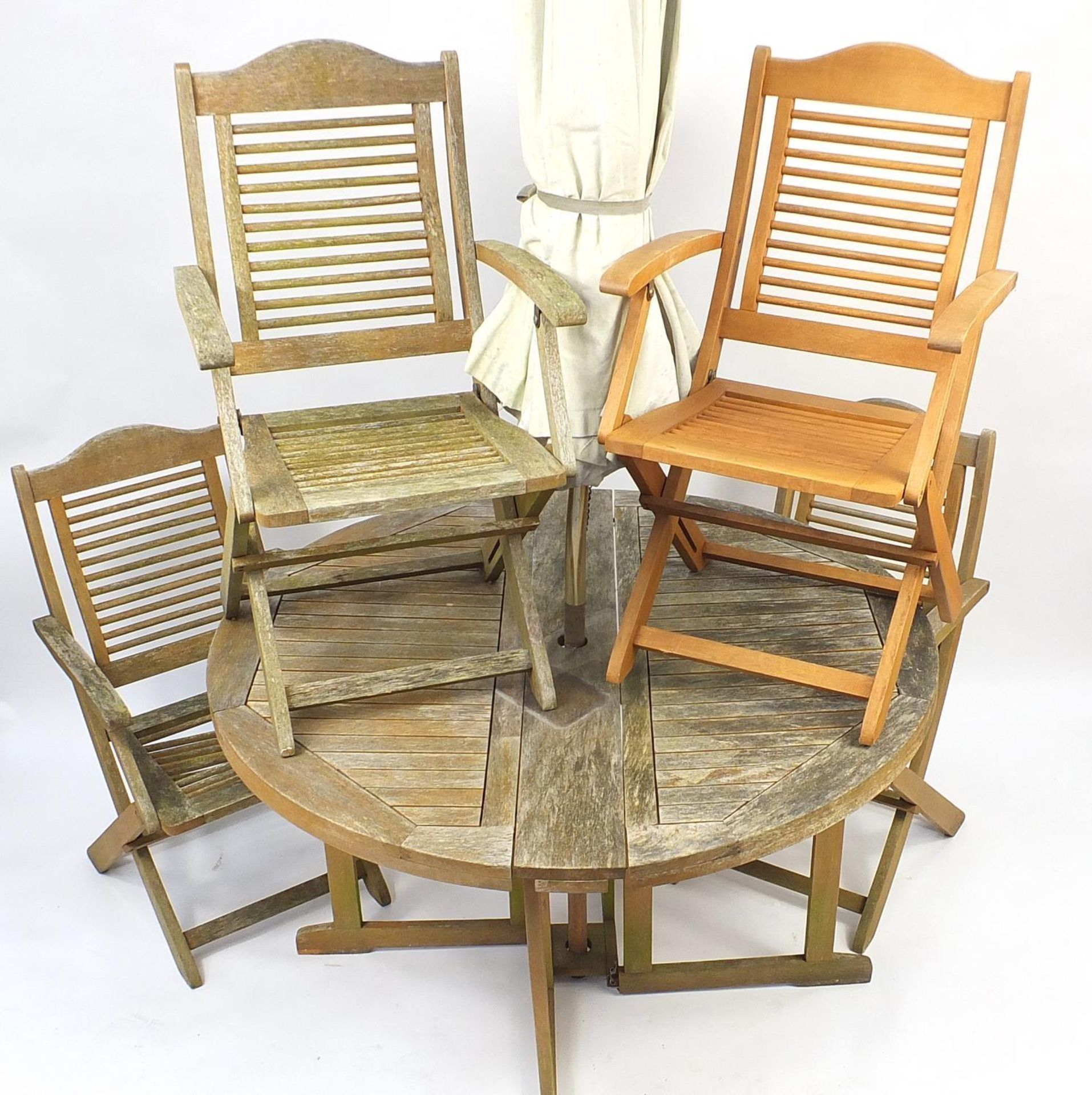 Teak folding garden table with parasol and four chairs - Image 2 of 2