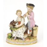 Meissen, 19th century German porcelain figure group of a boy and girl with goat, blue crossed