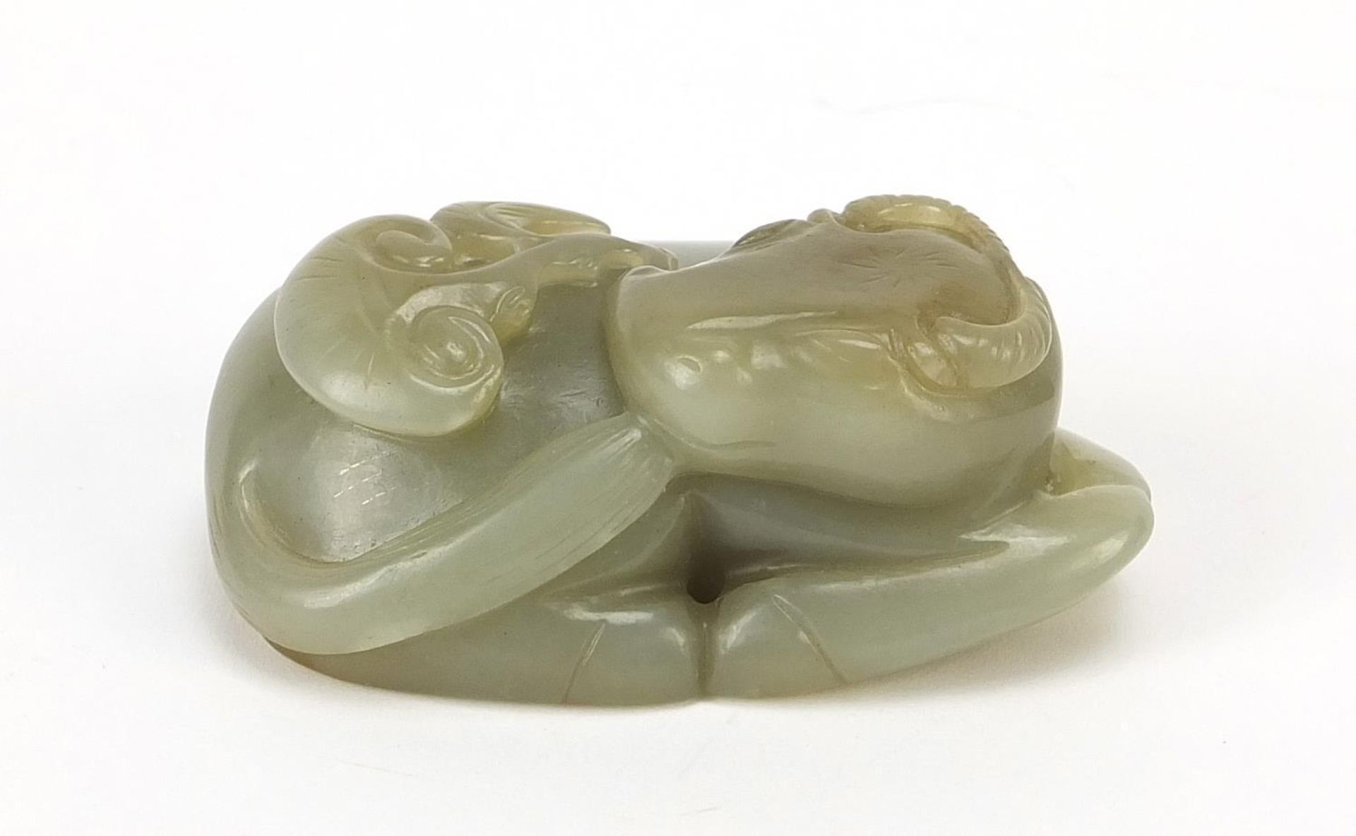 Chinese celadon and russet jade carving of a buffalo, 7cm wide - Image 2 of 7