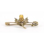 Unmarked gold and citrine thistle bar brooch, 3cm wide, 1.2g