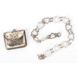 George V silver stamp case and a silver love heart bracelet, 18cm in length, total 8.8g