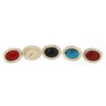 Five silver cabochon stone brooches including turquoise and mother of pearl, 2.8cm wide, 24.5g