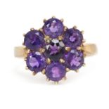 9ct gold amethyst flower head ring, size O, 3.2g