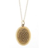 9ct gold Celtic design locket on 9ct gold necklace, the locket 1.6cm high, total 2.2g