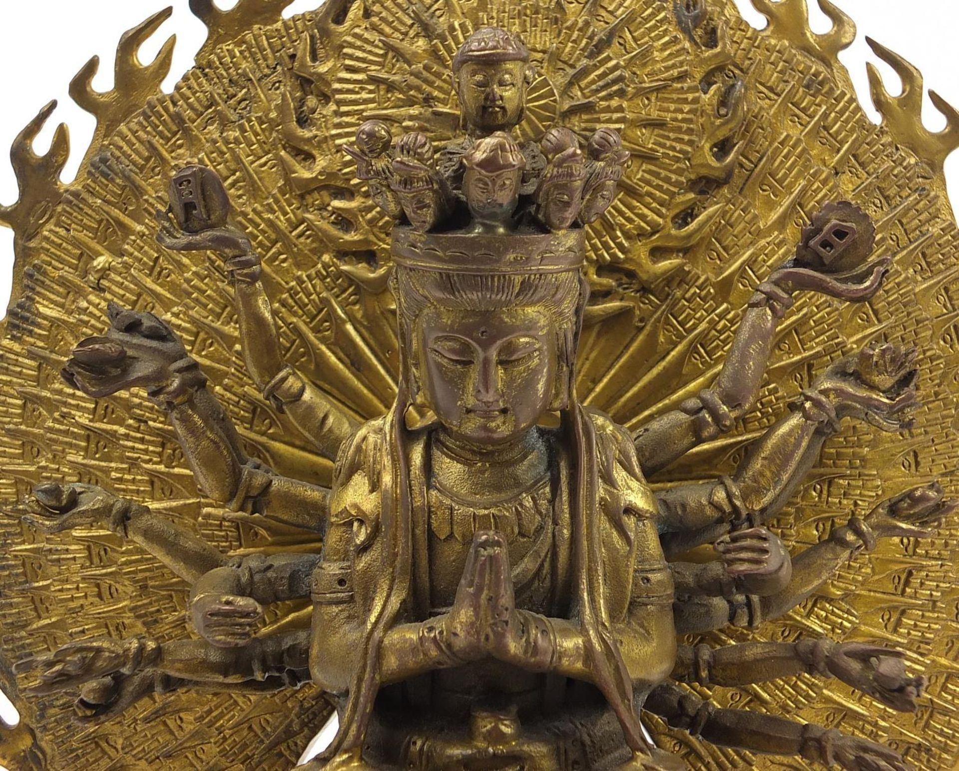 Tibetan gilt bronze figure of Buddha with lotus flower, 29.5cm high - Image 8 of 8