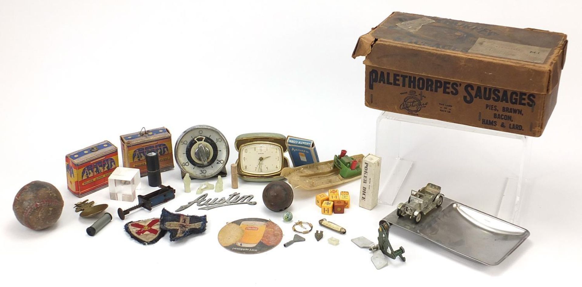 Objects including an advertising Palethorpes Sausage box and Smith's clock
