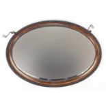 Oval rosewood effect bevel edged mirror, 82cm x 57cm