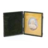 19th century oval hand painted portrait miniature of a young girl holding a rattle, housed in a