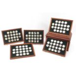The Hundred Great Masterpieces, one hundred Silver medals arranged in a fitted mahogany display case