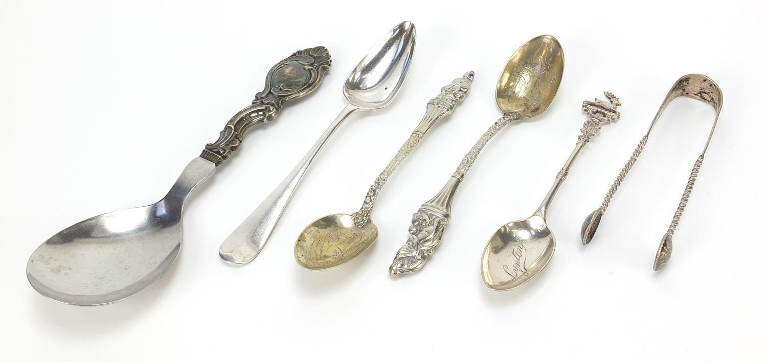 Antique and later silver and white metal flatware including a German silver handled spoon and a pair
