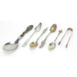 Antique and later silver and white metal flatware including a German silver handled spoon and a pair