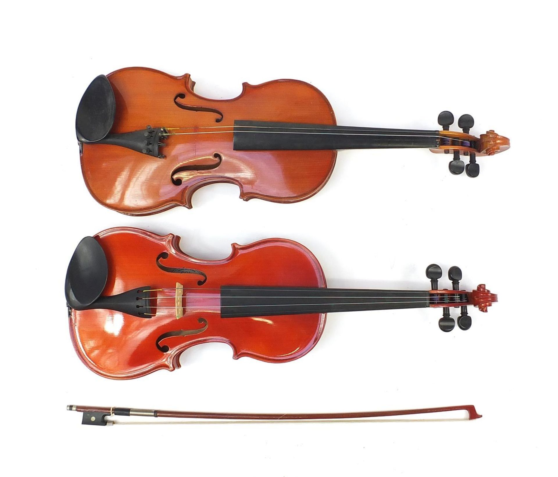 Two violins with cases