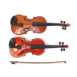 Two violins with cases