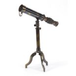 Military interest table telescope on stand, approximately 30cm high