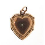 Victorian gilt metal love heart locket set with a seed pearl, 2cm high, 2.2g