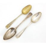 Three 18th century and later silver tablespoons including one by Philip Roker 1766-69, the largest