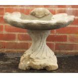 Stoneware garden shell shaped pedestal birdbath, 40cm high x 50cm in diameter