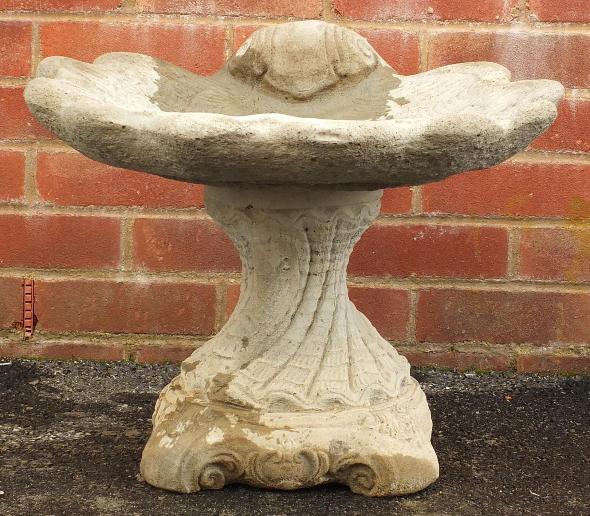 Stoneware garden shell shaped pedestal birdbath, 40cm high x 50cm in diameter