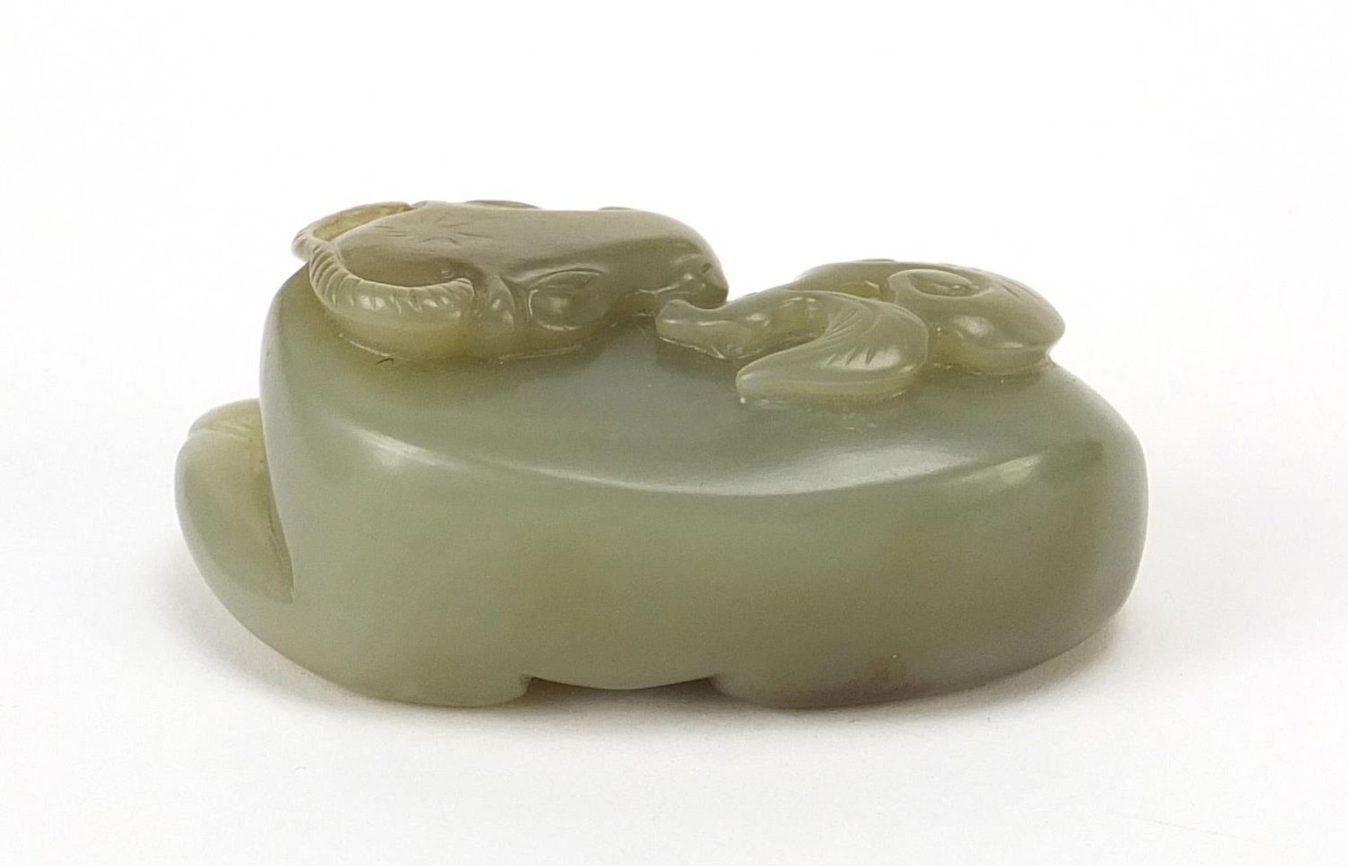 Chinese celadon and russet jade carving of a buffalo, 7cm wide - Image 4 of 7