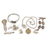 Silver and white metal jewellery including cufflinks, love heart necklace, dog brooch and acorn