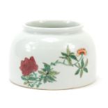 Chinese porcelain brush washer hand painted in the famille rose palette with flowers, six figure