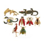 Eight jewelled and enamel animal and insect brooches including scorpion, crocodile, stork and
