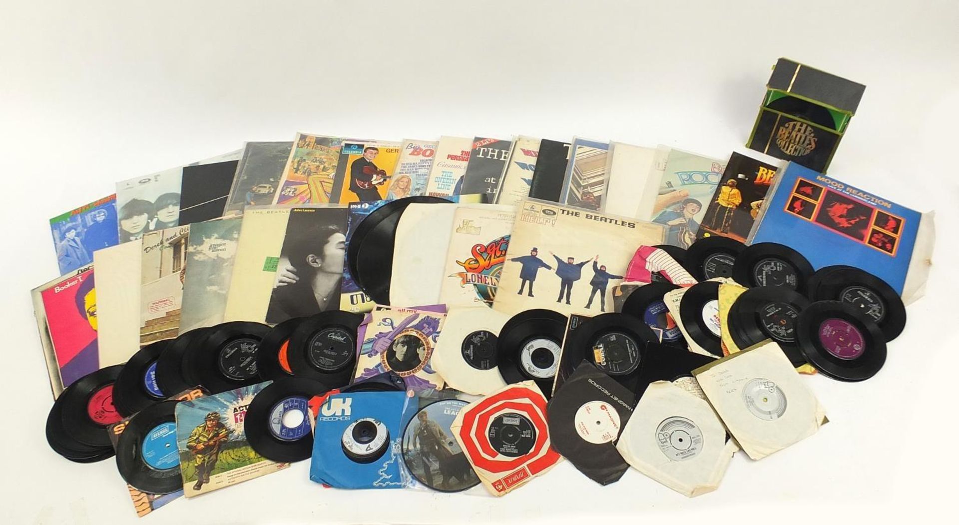 Vinyl LP's and 45rpm records including Led Zeppelin, The Beatles Collection and Abbey road